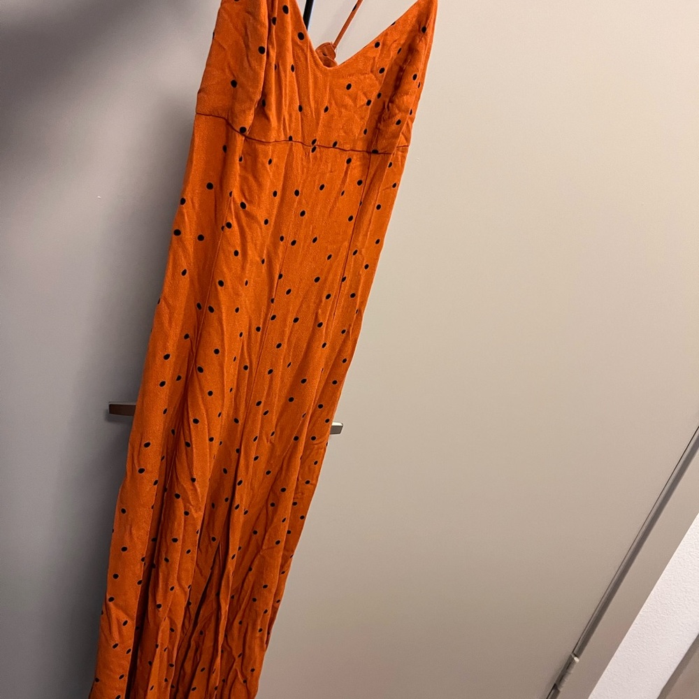 orange polka dot free people jumpsuit